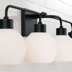 Capital Lighting Tanner 34''w X 9.75''h 4-light Vanity In Matte Black With Soft White Glass Globes