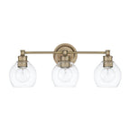 Capital Lighting Mid Century 23.5'' W X 10'' H X 7'' E 3-light Clear Glass Vanity In Aged Brass