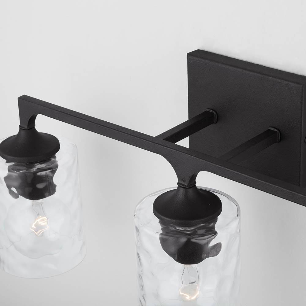 Capital Lighting Clint 23'' W X 10.5'' H X 6.5'' E 3-light Clear Water Glass Vanity In Black Iron