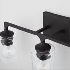 Capital Lighting Clint 23'' W X 10.5'' H X 6.5'' E 3-light Clear Water Glass Vanity In Black Iron