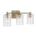 Capital Lighting 138331AD-491 Aged Brass 23'' W X 9'' H X 7'' E 3-light Seeded Embossed Glass Vanity In Aged Brass Image 1