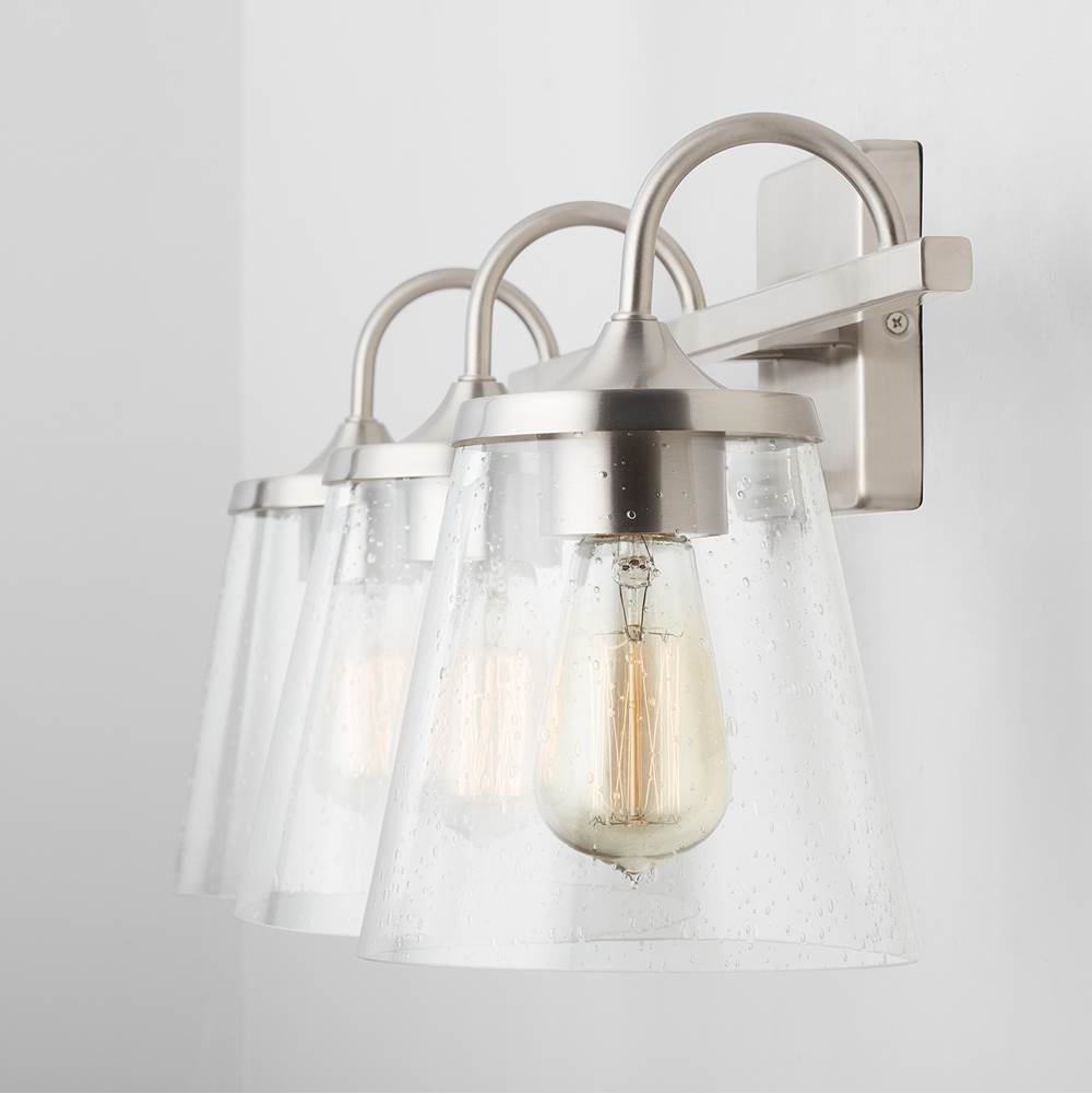 Capital Lighting Jayne 24'' W X 10.5'' H X 9'' E 3-light Vanity In Aged Brass With Clear Seeded Cone Glass Shades