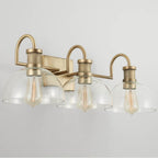 Capital Lighting 139133AD-497 Aged Brass 27'' W X 9'' H X 10.5'' E 3-light Vanity In Aged Brass With Clear Glass Dome Shades Image 5