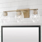 Capital Lighting 145331AD-525 Aged Brass 24'' W X 8'' H 3-light Vanity In Aged Brass With Wavy Embossed Glass Image 2