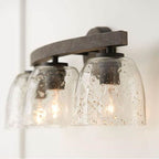 Capital Lighting Clive 24.5''w X 9.5''h 3-light Vanity In Carbon Grey And Black Iron With Stone Seeded Glass Handcrafted Of Wire-brushed Mango Wood