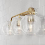 Capital Lighting Dolan 24.5''w X 9.5''h 3-light Vanity In Matte Brass With Clear Ribbed Glass