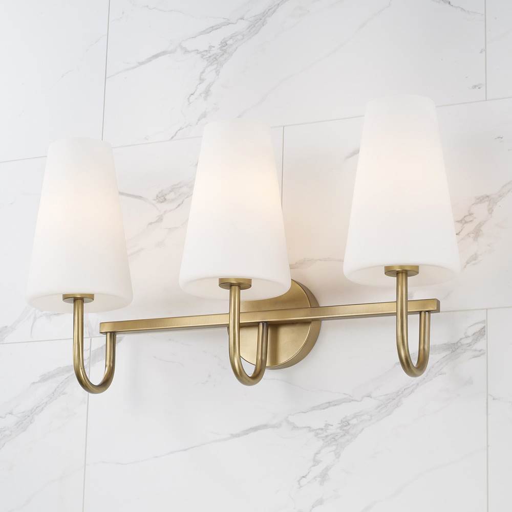 Capital Lighting Averitt 24'' W X 14.5'' H 3-light Vanity In Aged Brass With Tapered Soft White Glass