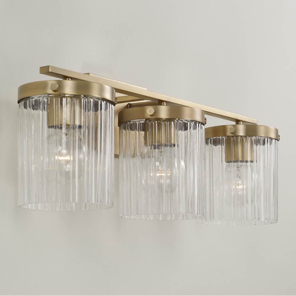 Capital Lighting Vaughn 24'' W X 9'' H 3-light Vanity In Aged Brass With Clear Beveled Fluted Glass
