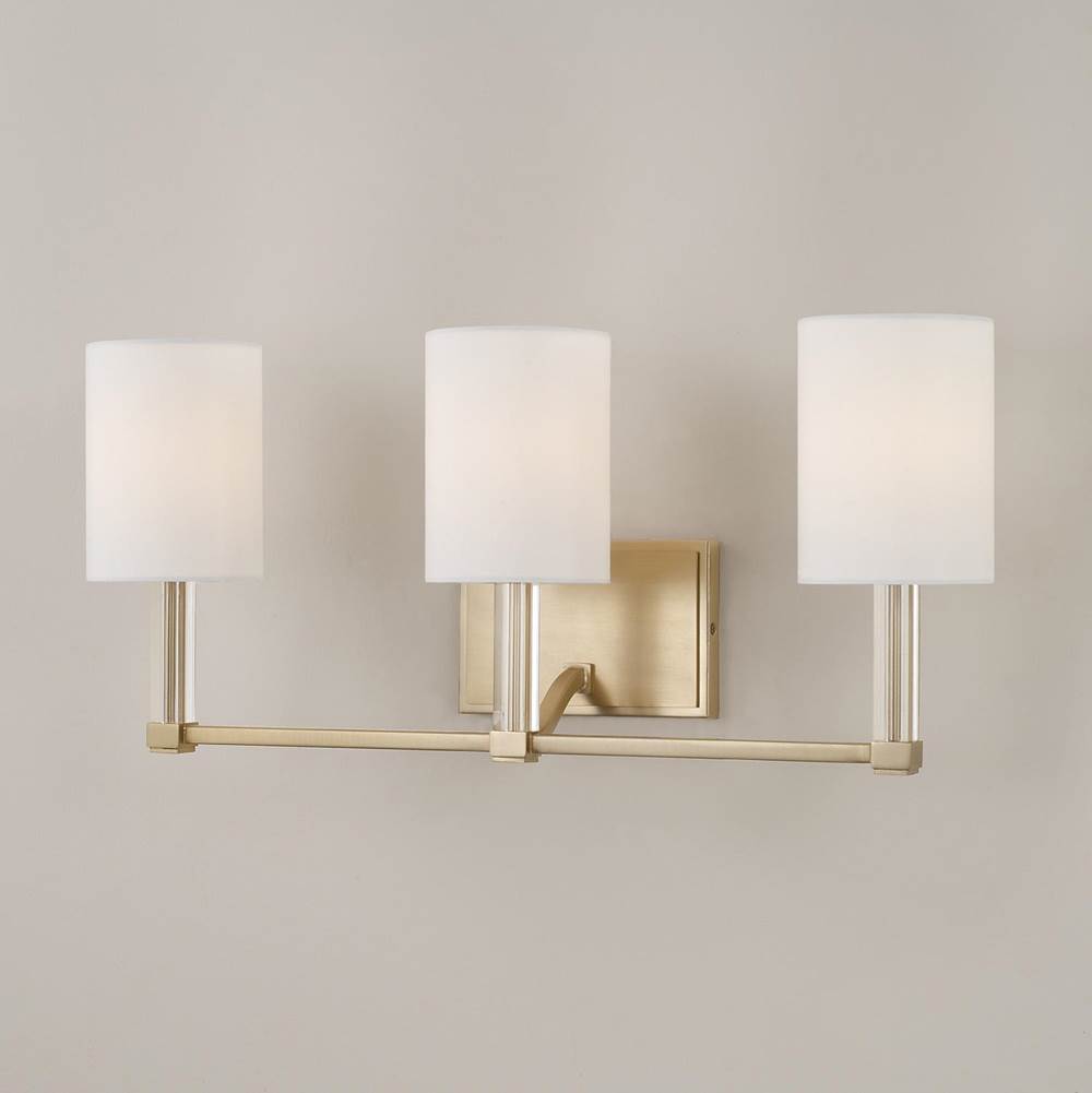 Capital Lighting Ingrid 24'' W X 9.75'' H 3-light Vanity In Matte Brass With Clear Acrylic Accents And Cylindrical White Fabric Shades