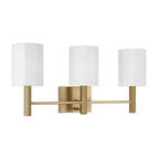 Capital Lighting 159531AD-716 Aged Brass 24.25'' W X 11.25'' H 3-light Vanity In Aged Brass With Octagonal White Fabric Shades Image 1
