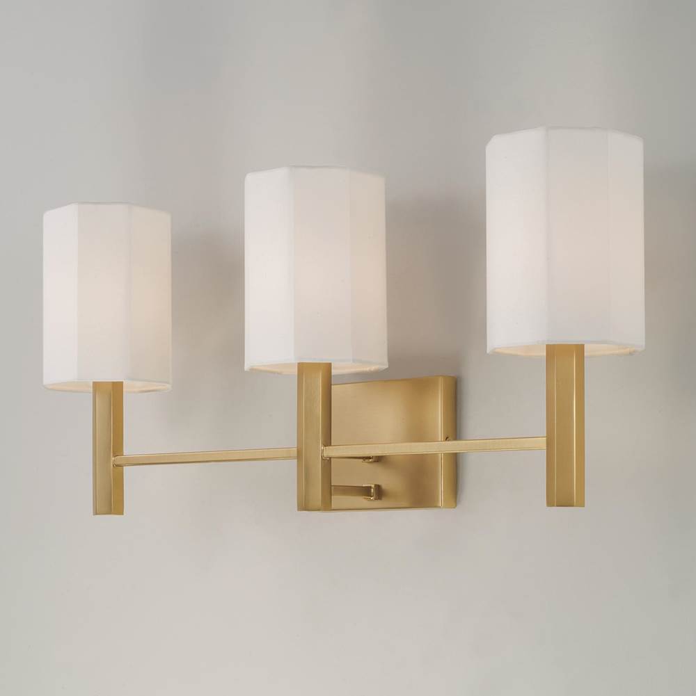 Capital Lighting Adrian 24.25'' W X 11.25'' H 3-light Vanity In Aged Brass With Octagonal White Fabric Shades