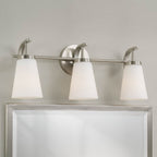 Capital Lighting Drake 23'' W X 9'' H  3-light Vanity In Aged Brass With Tapered Soft White Glass