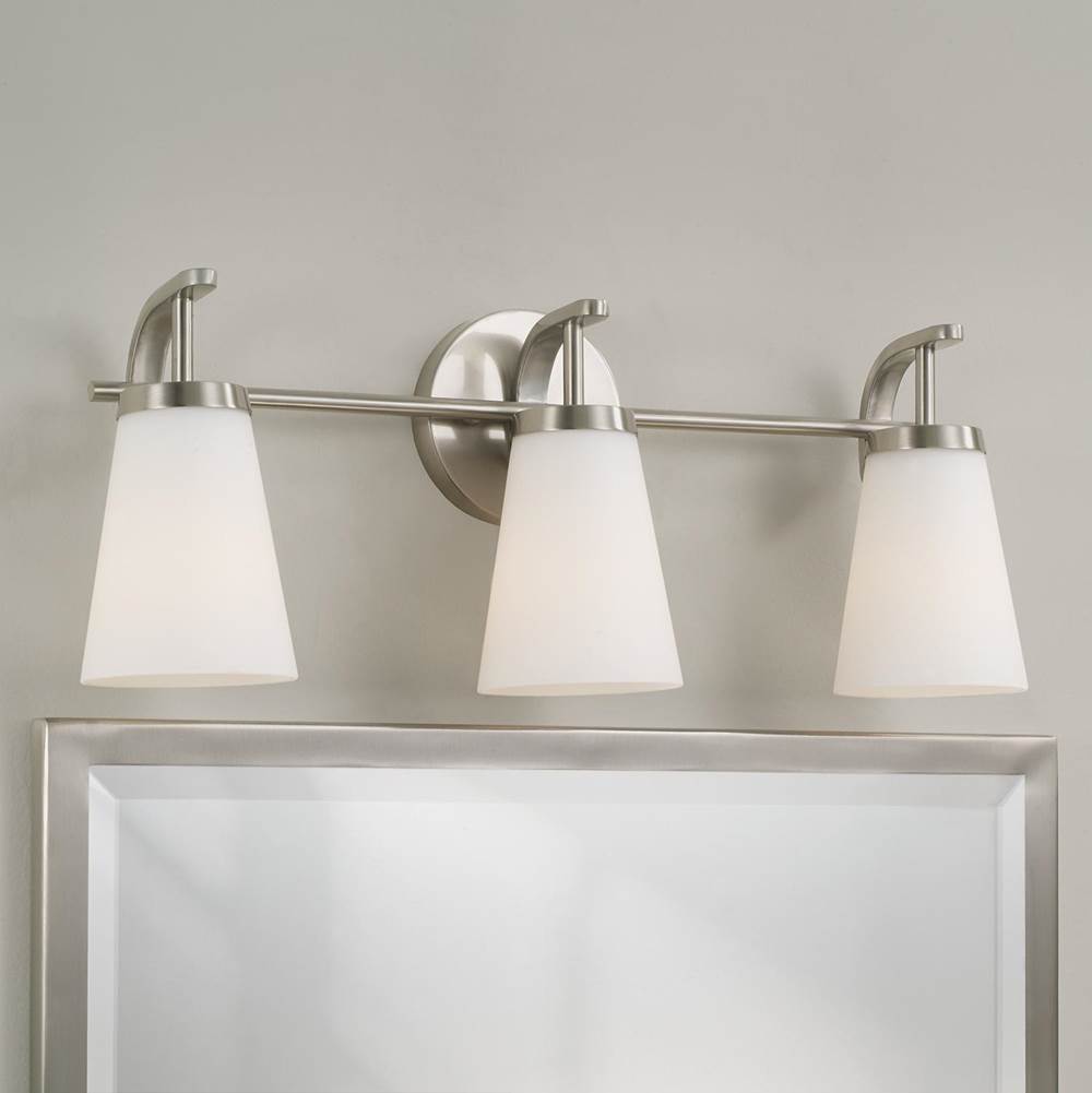 Capital Lighting Drake 23'' W X 9'' H  3-light Vanity In Aged Brass With Tapered Soft White Glass