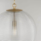 Capital Lighting Dolan 15''w X 16.75''h 1-light Globe Pendant In Matte Brass With Clear Ribbed Glass
