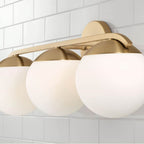 Capital Lighting AA1033MA Matte Brass 25.50''w X 9.50''h 3-light Vanity In Matte Brass With Soft White Glass Globes Image 3