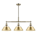 Golden Lighting 3306-LP AB-BCB Aged Brass Yep By Golden Lighting Orwell 3-light Island Light In Aged Brass And Brushed Champagne Brass Shade Image 1