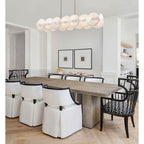 Arabela Lighting 85124-8 Lacquered Gold 53.5'' Tallulah Linear Chandelier In Lacquered Gold With White Swirl Glass And Clear Edging Image 3
