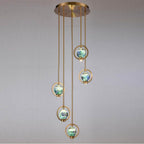 Arabela Lighting 85400-5 Lacquered Gold 16'' Utophia Pendant In Lacquered Gold With Blue Green Swirl Glass Globe Image 4